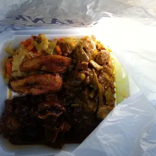 Curry goat and oxtail combo..Mmm...delish