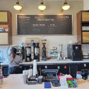 a woman standing at the counter