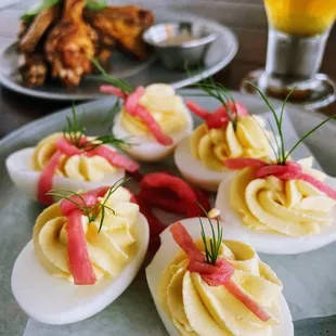 Deviled eggs and wings