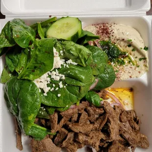 Beef shawarma with hummus and Greek salad