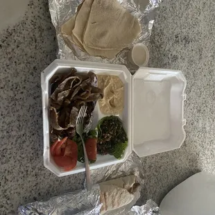 The gyro plate and Gyro Shawarma Sandwich