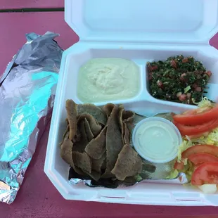 Exquisite lunch of hummus, tabouli, and shawarma (gyro) with tahini sauce. It's definitely "happy plate" material!