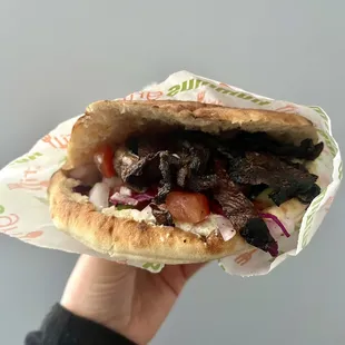 Portabella Sandwich with Tzatziki, tomatoes, cucumber, onion, and cabbage