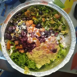 Salad with gyro, chicken and jalapeno hummus