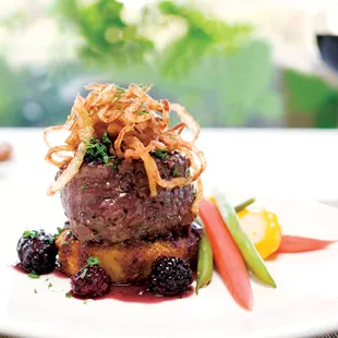 Fillet Mignon - wit crispy Yukon gold potato &amp; onion cake,  finished with a blackberry sage Cabernet reduction.