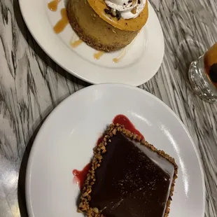 Dessert: pumpkin cheesecake and chocolate pyramid with raspberry sauce