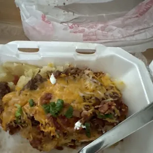 Loaded baked potato. Only one half of what they served.