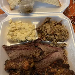 Wings brisket potato salad and dirty rice 2 meat plate