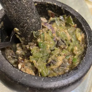 a mortar filled with food