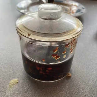 A small container of hot chili oil allows you to control the spiciness.
