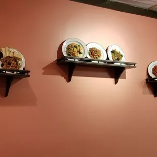plates of food on a wall