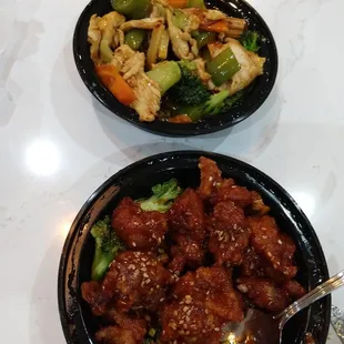 Hunan chicken and Sesame chicken (picture taken after I put food on my plate - huge servings! Also came with rice.)
