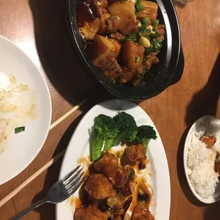 Braised pork belly on left and general tsos chicken on right.