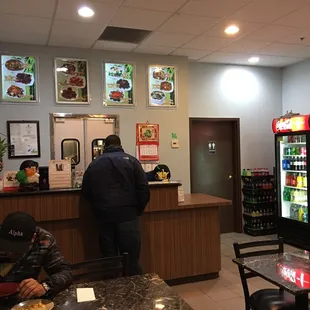 a man standing at the counter