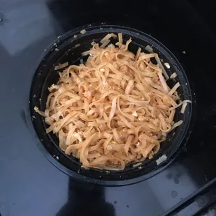 a bowl of noodles on a stove