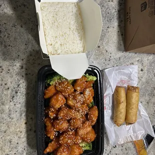 Sesame Chicken with white rice; Spring rolls