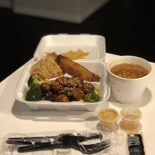 Sesame chicken with broccoli, fried rice, eggroll, hot and sour soup a delicious lunch - to go!