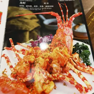 a plate of cooked lobsters