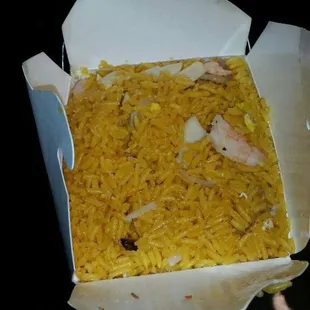 a box of rice and shrimp