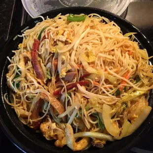Singapore Rice Noodles carry-out. Good amount of noodles &amp; meat but very little curry flavor.
