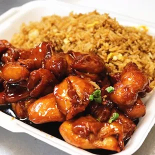 a takeout box of chinese food