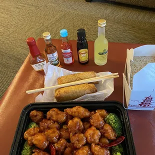General Tao Chicken with (actual) brown rice, broccoli and egg rolls.