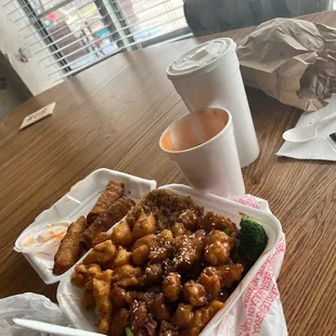 Sesame Chicken and Sweet and Sour Chicken with egg rolls and egg drop soup