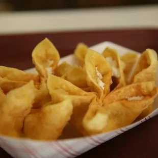 a basket of fried food on a table