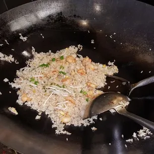 Preparing Shrimp Fried Rice with the freshest ingredients in our open kitchen. Come watch us prepare your food.  HUNAN FAMILY