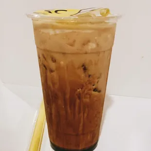 iced coffee with a lemon wedge