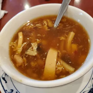 a bowl of soup on a plate