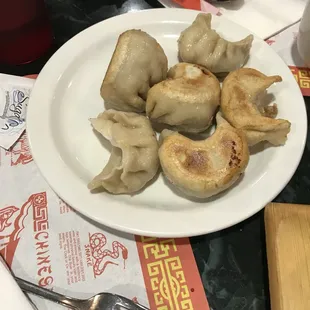 a plate of dumplings on a table