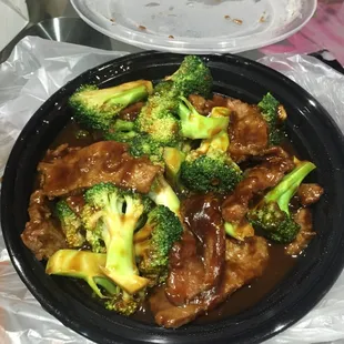 Beef and broccoli with rice on the side