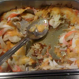 a serving dish of shrimp and crab