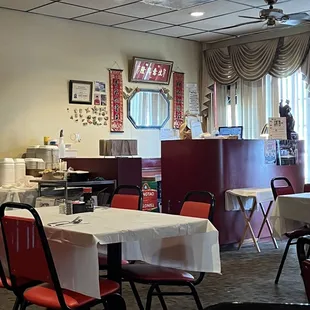 dining area with tables and chairs