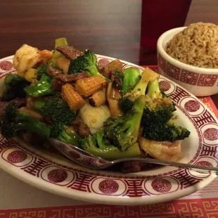 Hunan Triple. Chicken, beef, and shrimp. Lots of veggies!!  Hunan sauce... HOT. Yummm