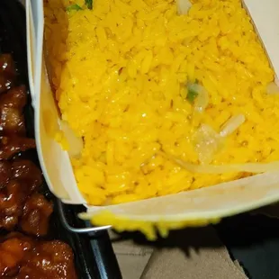 a box of fried chicken and a box of macaroni and cheese