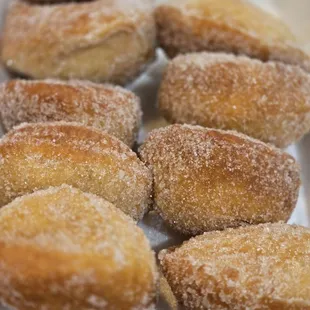 Sugared donuts. The order came with 10 still hot donuts. The photo has 9 donuts. The first one didn't make it out of the parking lot! :)