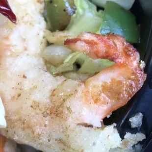 a plate of food with shrimp and vegetables