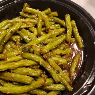 Green beans. The guy said it would be dry. But it turned out very wet with oil.