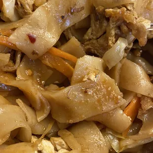 Chicken Pad Thai and a steel bristle.