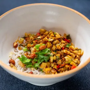 a bowl of rice and vegetables