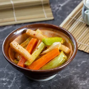 a bowl of stir fried vegetables
