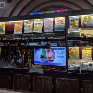 Pull tabs, full bar and poor draft beer selection.