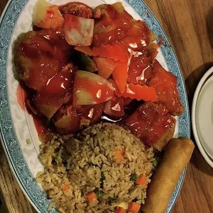 Sweet and sour chicken, fried rice, and egg roll