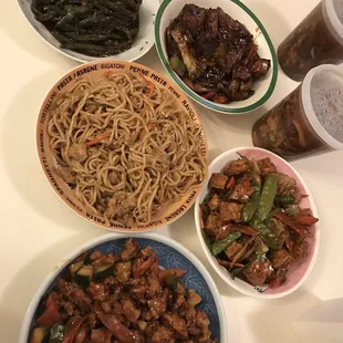 Chicken lo mein, yu Hsiang eggplant, sautéed string beans, hot and sour soup, fried tofu, Kung pao chicken ( chicken tasted kinda funny )