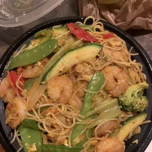 Shrimp Singapore noodles with no mushrooms, siracha,soy sauce,and duck sauce helps so much