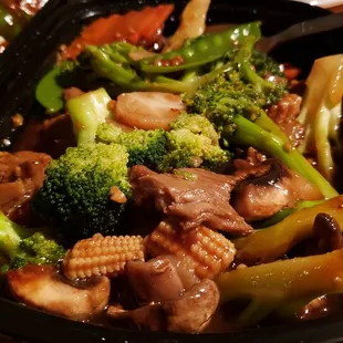Mock duck with vegetables ($12), vegan by default. Tasty, but the tofu family style, mapo tofu or Buddha&apos;s Delight are all better.