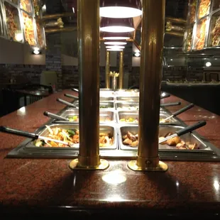 a buffet with a variety of food items