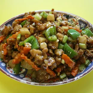 a bowl of stir fried vegetables